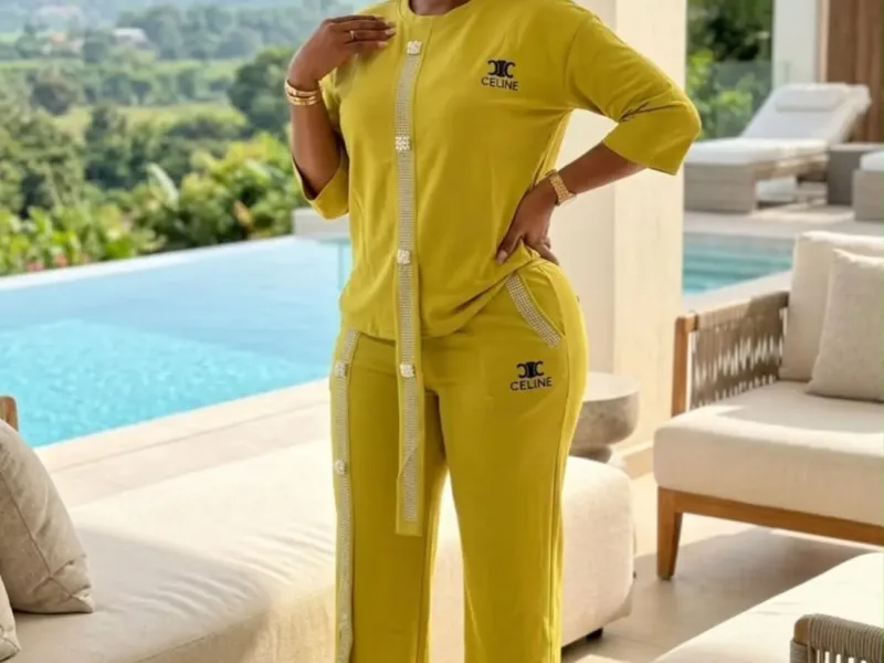 Women’s matching two-piece lounge/co-ord set (elbow-sleeve top and straight-leg trousers).