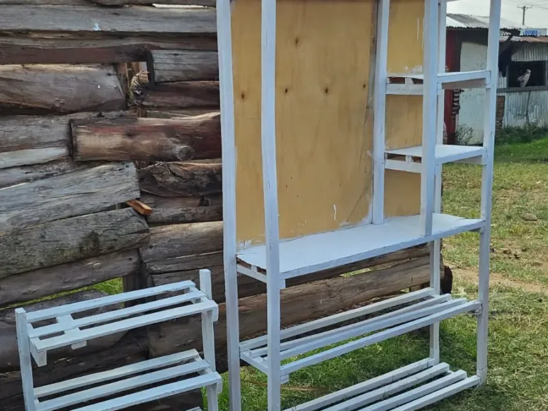 Handcrafted white-painted wooden wardrobe and storage organizer